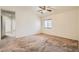 Neutral bedroom with carpet, window with blinds, and ceiling fan at 3636 Remington Grove Ave, North Las Vegas, NV 89081