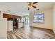 Bright and spacious living room flows into the modern kitchen, with beautiful hard surface floors at 3636 Remington Grove Ave, North Las Vegas, NV 89081