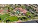 Aerial view of community center showcasing pool, putting green, tennis courts, and landscaping at 3720 Rocklin Peak Ave, North Las Vegas, NV 89081