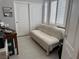 This is a bedroom with white walls and light tile floors at 3720 Rocklin Peak Ave, North Las Vegas, NV 89081
