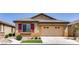 Charming single-story home with a well-manicured lawn and a two-car garage at 3720 Rocklin Peak Ave, North Las Vegas, NV 89081