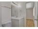 Bathroom featuring a vanity with stone countertop, modern lighting, and convenient toiletry storage creating a serene retreat at 4484 Bennett Dr, Las Vegas, NV 89121