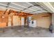 An oversized garage, including laundry units, is spacious enough for two cars and extra storage at 4484 Bennett Dr, Las Vegas, NV 89121