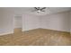 Large living area with neutral walls, tile flooring, and an open doorway at 4484 Bennett Dr, Las Vegas, NV 89121