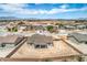 This single-story home with neutral tones provides a blank backyard canvas to create your vision at 4781 Stoneham, Pahrump, NV 89061