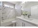 Bright bathroom showcases marble-look tile, modern fixtures, and plenty of light at 4781 Stoneham, Pahrump, NV 89061