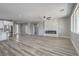 Open floor plan featuring a modern fireplace and access to the kitchen at 4781 Stoneham, Pahrump, NV 89061