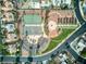 Aerial view of a neighborhood park equipped with tennis courts and a playground at 4878 Califa Dr, Las Vegas, NV 89122