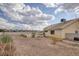 Large backyard area for personalization and enjoyment with some small plant beds at 4878 Califa Dr, Las Vegas, NV 89122