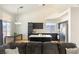 This spacious kitchen features black cabinets, an island, stainless steel appliances, and modern lighting at 4878 Califa Dr, Las Vegas, NV 89122