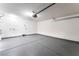 Spacious two car garage featuring sealed concrete floor and plenty of room for parking and storage at 5751 Mabel Rd, Las Vegas, NV 89110
