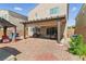 Backyard featuring desert landscaping and shaded seating area at 6322 Angora Peak Ln, Las Vegas, NV 89115