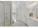 Bright bathroom features shower, dual sink vanity, and modern finishes at 6322 Angora Peak Ln, Las Vegas, NV 89115