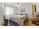 Cozy bedroom features natural light, soft carpets, and a ceiling fan at 6322 Angora Peak Ln, Las Vegas, NV 89115