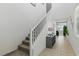 Bright entryway featuring a staircase, neutral decor, and tile flooring at 6322 Angora Peak Ln, Las Vegas, NV 89115