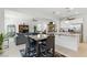 Open floor plan features a seamless flow between the living room, kitchen, and dining area at 6322 Angora Peak Ln, Las Vegas, NV 89115