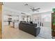 Open-concept living space with kitchen, dining, and cozy seating area at 6322 Angora Peak Ln, Las Vegas, NV 89115