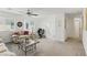 Upstairs living room with seating, exercise equipment, and bright natural light at 6322 Angora Peak Ln, Las Vegas, NV 89115