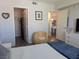 Comfortable bedroom with an open closet and dining area entrance, bathed in natural light at 6650 W Warm Springs Rd # 2159, Las Vegas, NV 89118