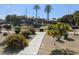 Well-maintained community playground surrounded by trees, walkways and landscaping at 6650 W Warm Springs Rd # 2159, Las Vegas, NV 89118