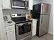 Close up of the kitchen featuring stainless steel appliances, and white cabinets at 6650 W Warm Springs Rd # 2159, Las Vegas, NV 89118