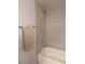 Shower stall featuring modern grey tiling, a shower head, and a handheld shower fixture at 6650 W Warm Springs Rd # 2159, Las Vegas, NV 89118