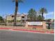 Attractive community signage with lush landscaping and manicured grounds at 6650 W Warm Springs Rd # 2159, Las Vegas, NV 89118