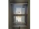 A clear view through a window with blinds, offering natural light and outdoor scenery at 6650 W Warm Springs Rd # 2159, Las Vegas, NV 89118