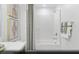 Cozy bathroom with shower over bath, vanity sink, and tile shower at 6740 Nimbus Ave # Lot 10, Las Vegas, NV 89130