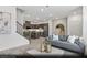 Open concept living space featuring a modern kitchen and cozy seating area, perfect for entertaining at 6740 Nimbus Ave # Lot 10, Las Vegas, NV 89130
