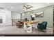 Versatile loft space perfect for a home office, featuring a built-in desk and stylish seating at 6740 Nimbus Ave # Lot 10, Las Vegas, NV 89130