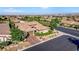 Breathtaking aerial view of the property showcasing the meticulously landscaped front yard at 748 Puerto Real Ct, Las Vegas, NV 89138