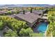 Beautiful single-story home features a private pool, lush landscaping, and mountain views at 748 Puerto Real Ct, Las Vegas, NV 89138