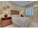 Cozy bedroom with a woven headboard, natural light, and comfortable decor creating a relaxing space at 748 Puerto Real Ct, Las Vegas, NV 89138