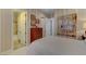Stylish bedroom showcasing natural light, ensuite bathroom, and neutral decor at 748 Puerto Real Ct, Las Vegas, NV 89138
