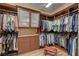 Walk-in closet providing ample storage space and organization with custom shelving and cabinetry at 748 Puerto Real Ct, Las Vegas, NV 89138
