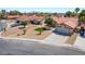 Wide angle view of a single story home with desert landscaping at 8000 Vista Twilight Dr, Las Vegas, NV 89123