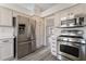 Well-equipped kitchen featuring stainless steel appliances, ample counter space and modern cabinetry at 8000 Vista Twilight Dr, Las Vegas, NV 89123