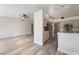 Open floor plan featuring an open living room and kitchen with stainless steel appliances at 8000 Vista Twilight Dr, Las Vegas, NV 89123