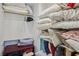 Storage solutions abound in this organized closet with shelves and hanging space at 8104 Wispy Sage Way, Las Vegas, NV 89149