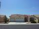 Charming single-story home with a two-car garage and a well-maintained front yard landscape at 8545 Summer Vista Ave, Las Vegas, NV 89145