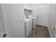 Laundry room with washer, dryer, and overhead storage shelf at 8545 Summer Vista Ave, Las Vegas, NV 89145