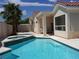 Backyard pool with tile accents, jacuzzi and palm trees at 8545 Summer Vista Ave, Las Vegas, NV 89145