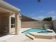 Backyard swimming pool with adjacent jacuzzi surrounded by a patio at 8545 Summer Vista Ave, Las Vegas, NV 89145
