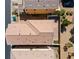 Aerial view of a home with desert landscaping, tile roof, and a patio area at 9543 Havasu Canyon Ave, Las Vegas, NV 89166