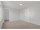 Neutral bedroom features carpet flooring, light walls, and a closet for storage at 9543 Havasu Canyon Ave, Las Vegas, NV 89166