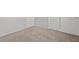 Neutral bedroom featuring multiple closets and carpet flooring at 9543 Havasu Canyon Ave, Las Vegas, NV 89166
