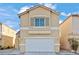 Two-story home featuring neutral paint, a two-car garage, and a well-kept front yard at 9543 Havasu Canyon Ave, Las Vegas, NV 89166