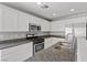 Well-equipped kitchen with granite countertops, stainless steel appliances, and ample cabinet space at 9543 Havasu Canyon Ave, Las Vegas, NV 89166