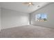 Bright main bedroom with vaulted ceiling, neutral carpeting and ample natural light at 9543 Havasu Canyon Ave, Las Vegas, NV 89166